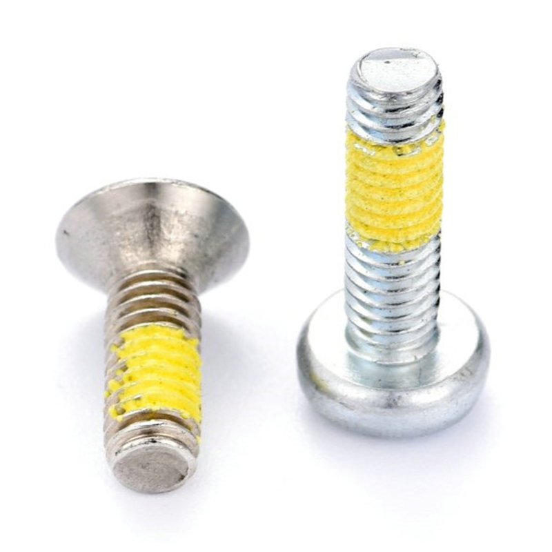 Tornillo para máquina Torx (hexadecimal) con cabeza de sartén (avellanada) y parche de nailon amarillo